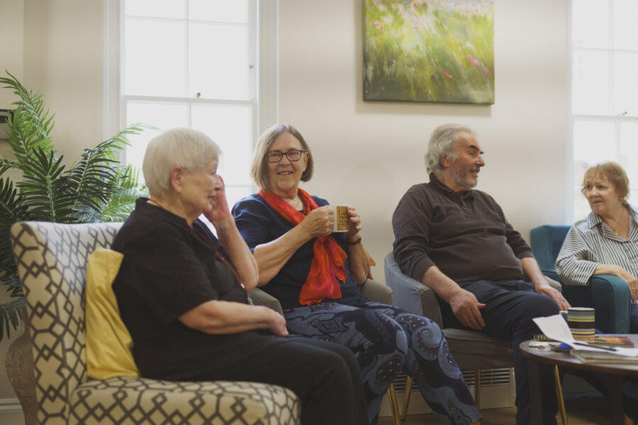 St John's residents sit together